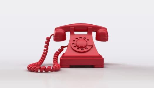 Ein rotes Telefon als Symbol für die schnelle Hotline
